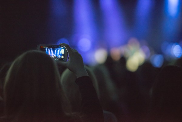 Girl-Filming-Live-Concert-On-Smartphone